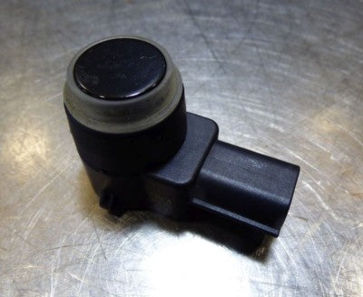 Original Opel Astra J Sensor Einparkhilfe PDC GM Schwarz gebraucht - 1328288 – Produktansicht 1