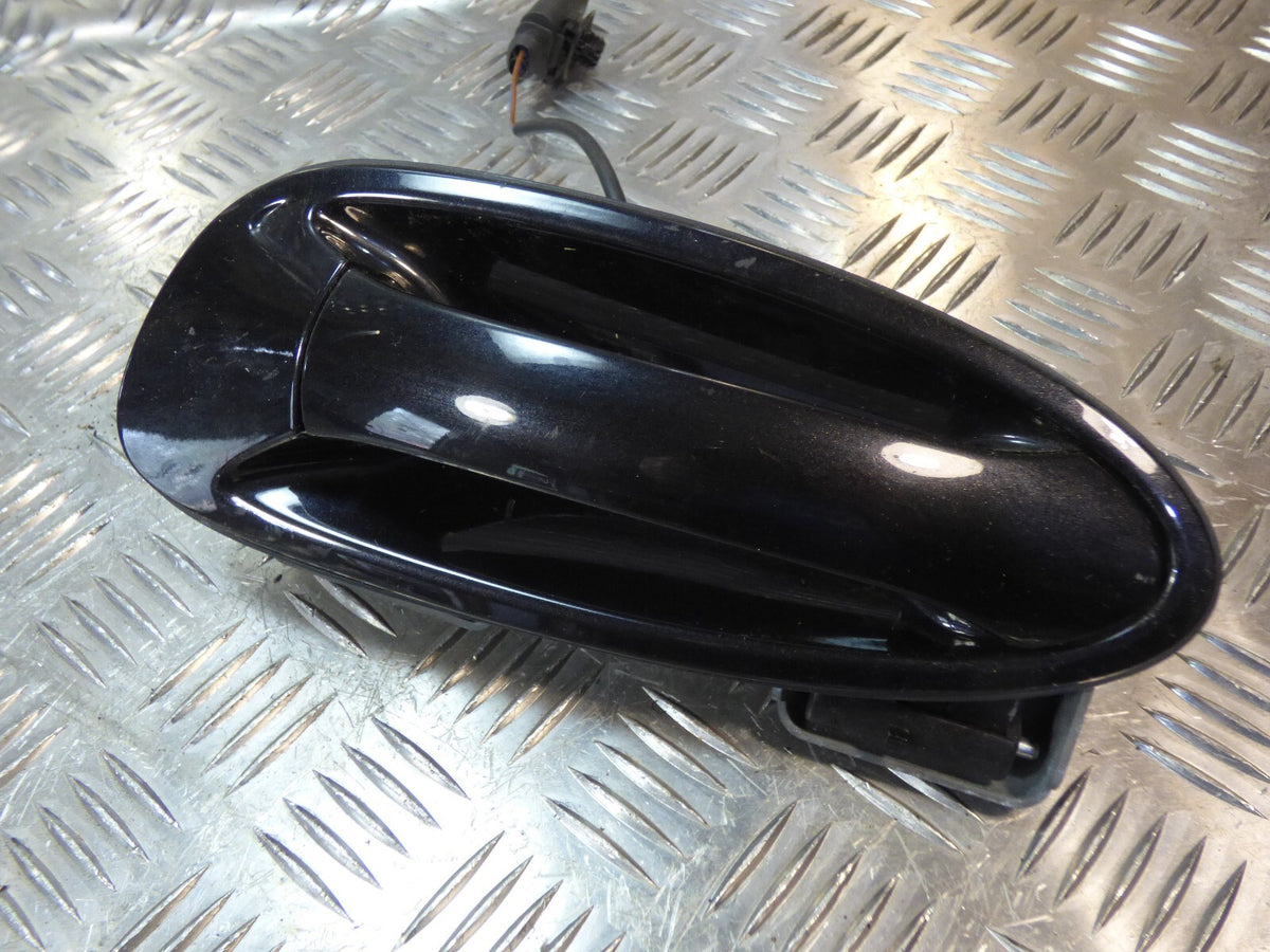 Porsche Boxster 987 Original Türgriff vorne links schwarz RHD gebraucht - 99753706300 – Produktansicht 1